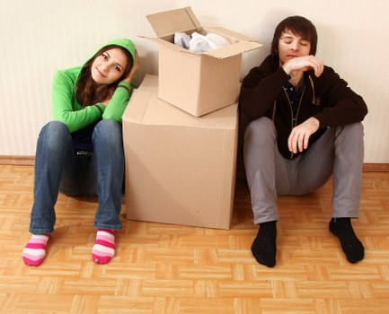Bullscross moving truck loaded with household boxes and appliances