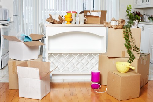 Furniture and boxes being handled for an apartment move in Bullscross