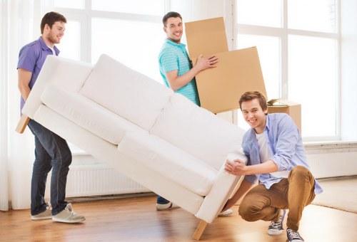 Local removals team unloading belongings in Bullscross