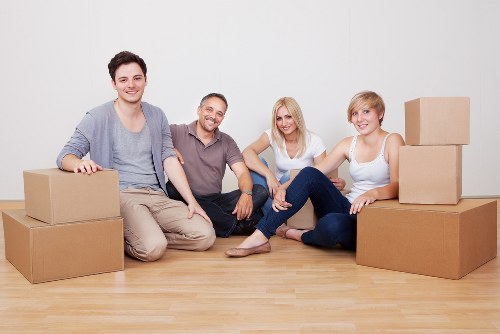 Packed boxes and household items arranged securely inside a moving van