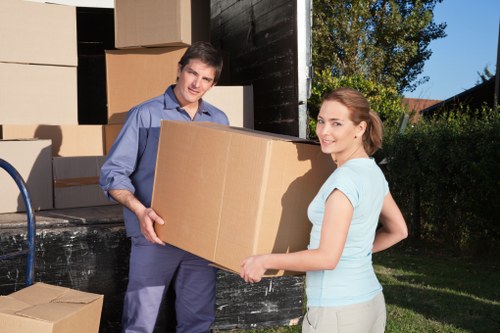 Moving truck loaded with household furniture and boxes